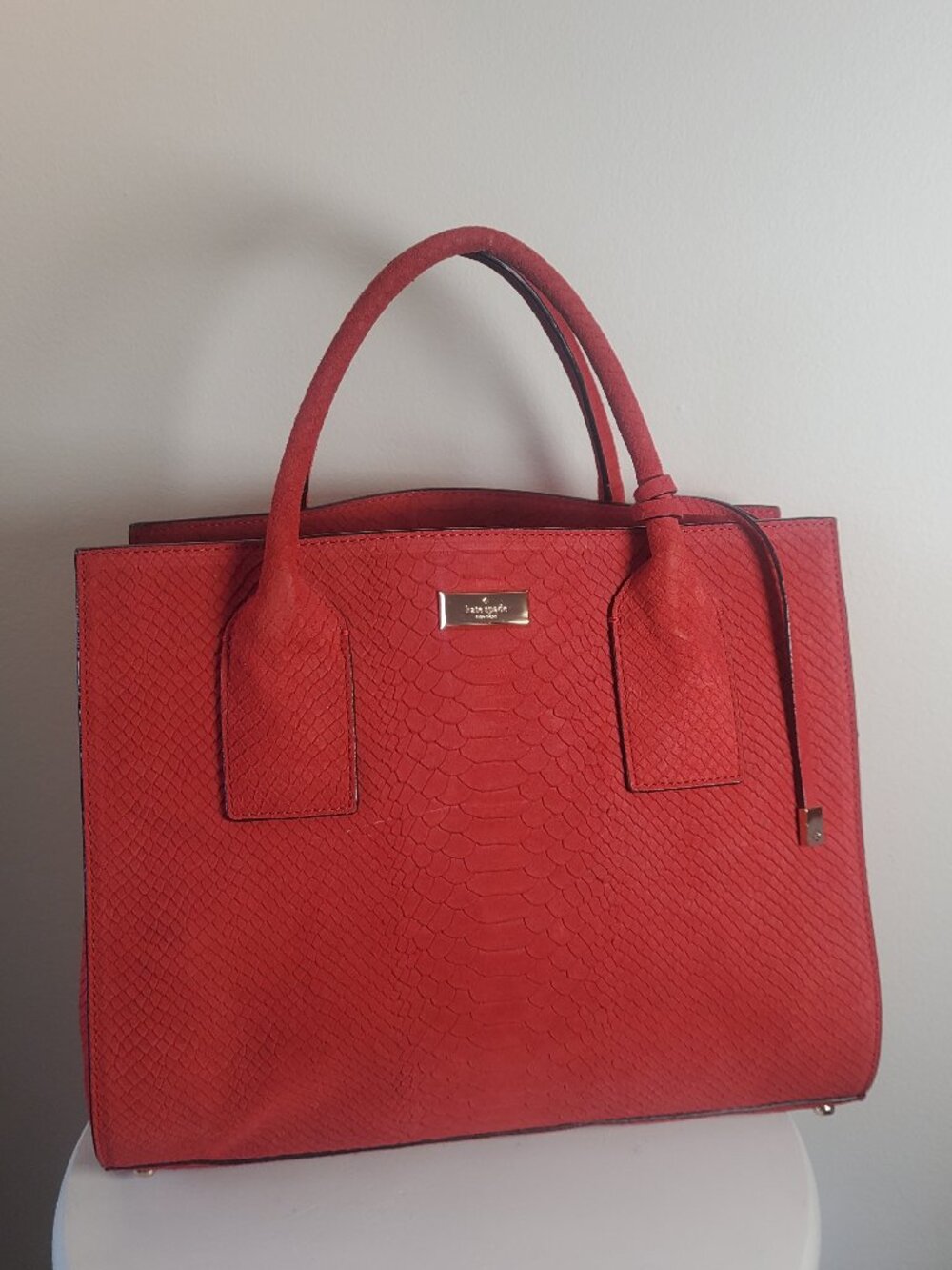 19. Kate Spade New York Red Embossed Suede Large Top Handle Bag